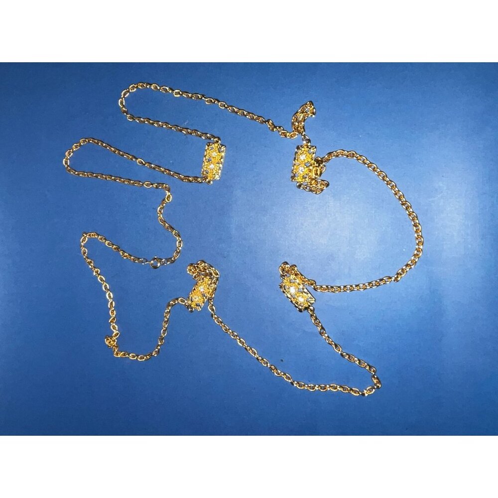 Long 26" gold tone rope necklace w square charms has faux diamonds